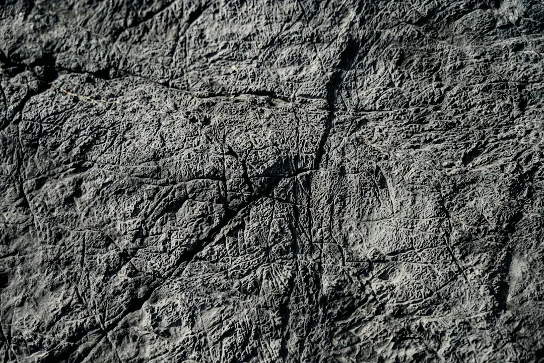 Fine-grained charcoal basalt slab surface